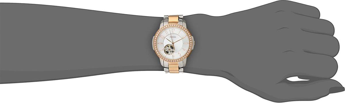 Fossil Architect automatic women's watch worn on wrist with two-tone stainless steel bracelet
