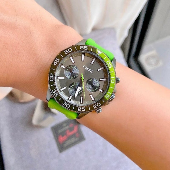 Fossil Bannon BQ2501 chronograph worn on wrist showing green strap and olive dial