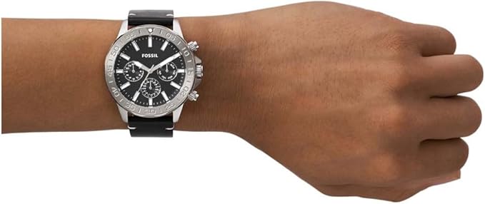 Fossil Bannon multifunction watch worn on wrist with black leather strap