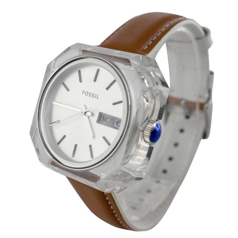 Fossil Candy ES3538 watch at angle showing white dial, clear case, and brown leather strap