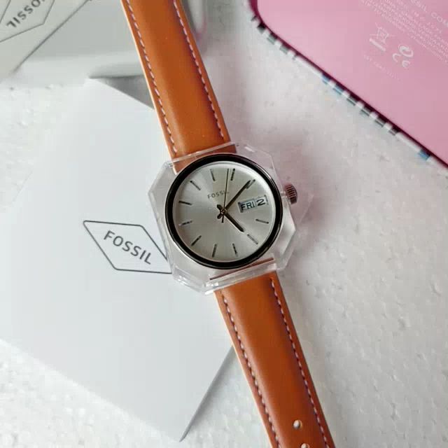 Fossil Candy ES3538 watch on wrist showing white dial, clear octagonal case, and brown leather strap