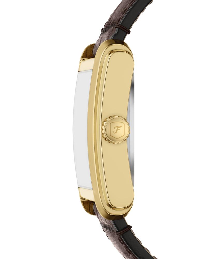 Side view of Fossil Carraway watch showing gold-tone case profile with brown leather strap