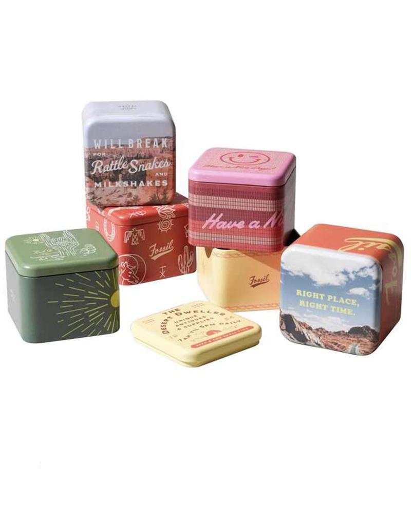 Fossil Everett watch box and packaging with various branded containers