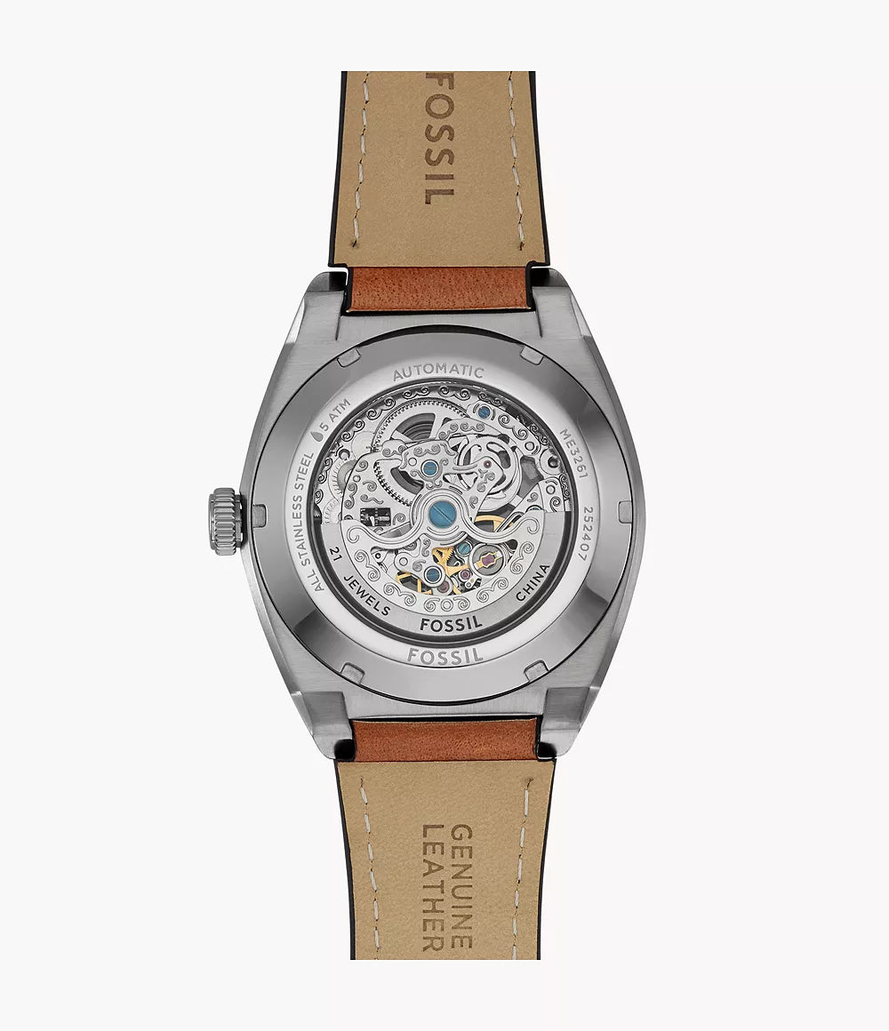 Fossil Everett skeleton caseback with visible automatic movement and Fossil branding on stainless steel case