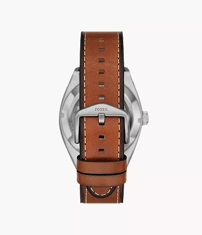 Fossil Everett watch caseback showing brown leather strap with white stitching and stainless steel case