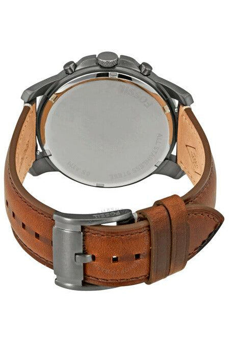 Case back view of Fossil Grant watch showing brown leather strap and metal case back