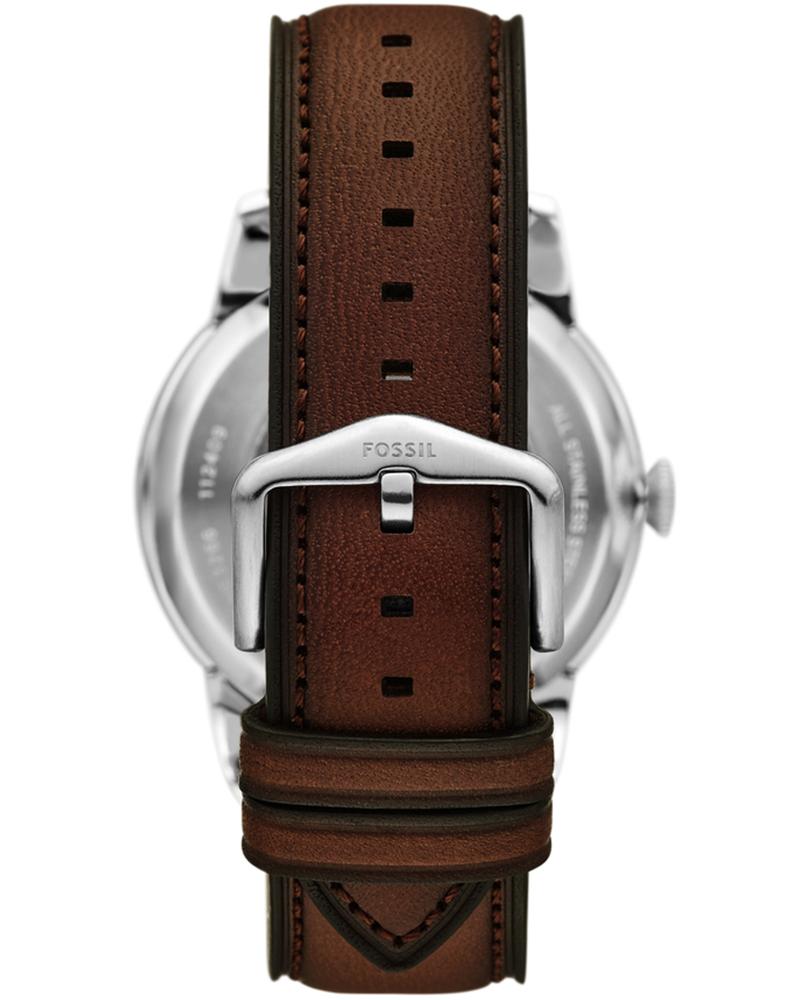 Caseback view of Fossil Inscription watch with brown leather strap and metal clasp
