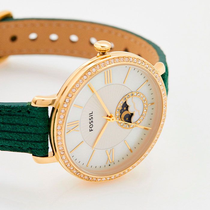 Fossil Jacqueline dial detail showing moonphase complication at 6 o'clock and gold-tone Roman numerals