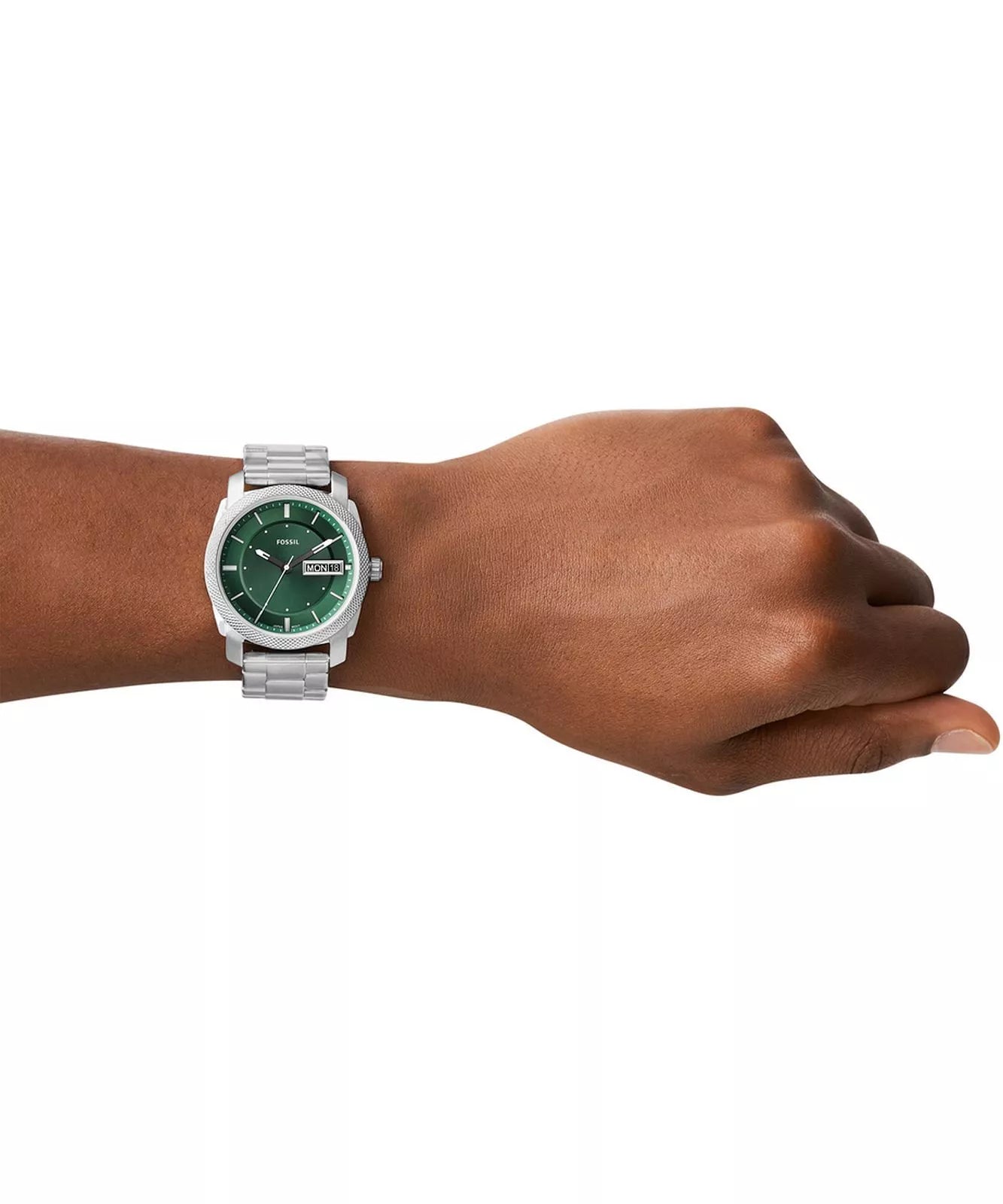 Fossil Machine FS5899 watch worn on wrist showing green dial and stainless steel bracelet