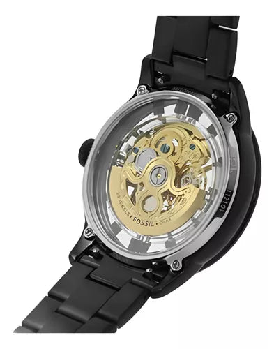Fossil Townsman ME3197 watch caseback showing skeleton movement and mechanical gears