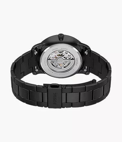 Fossil Neutra caseback showing automatic movement with rotor visible