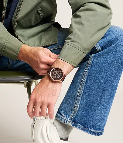 Fossil Townsman automatic watch worn on wrist with brown leather strap