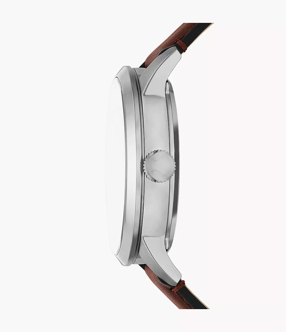 Fossil Townsman ME3267 side profile with silver case, brown leather strap, and visible crown
