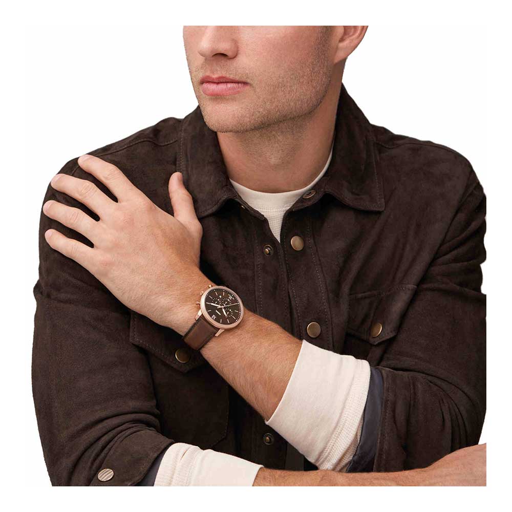 Fossil Neutra chronograph watch worn on wrist with brown leather strap