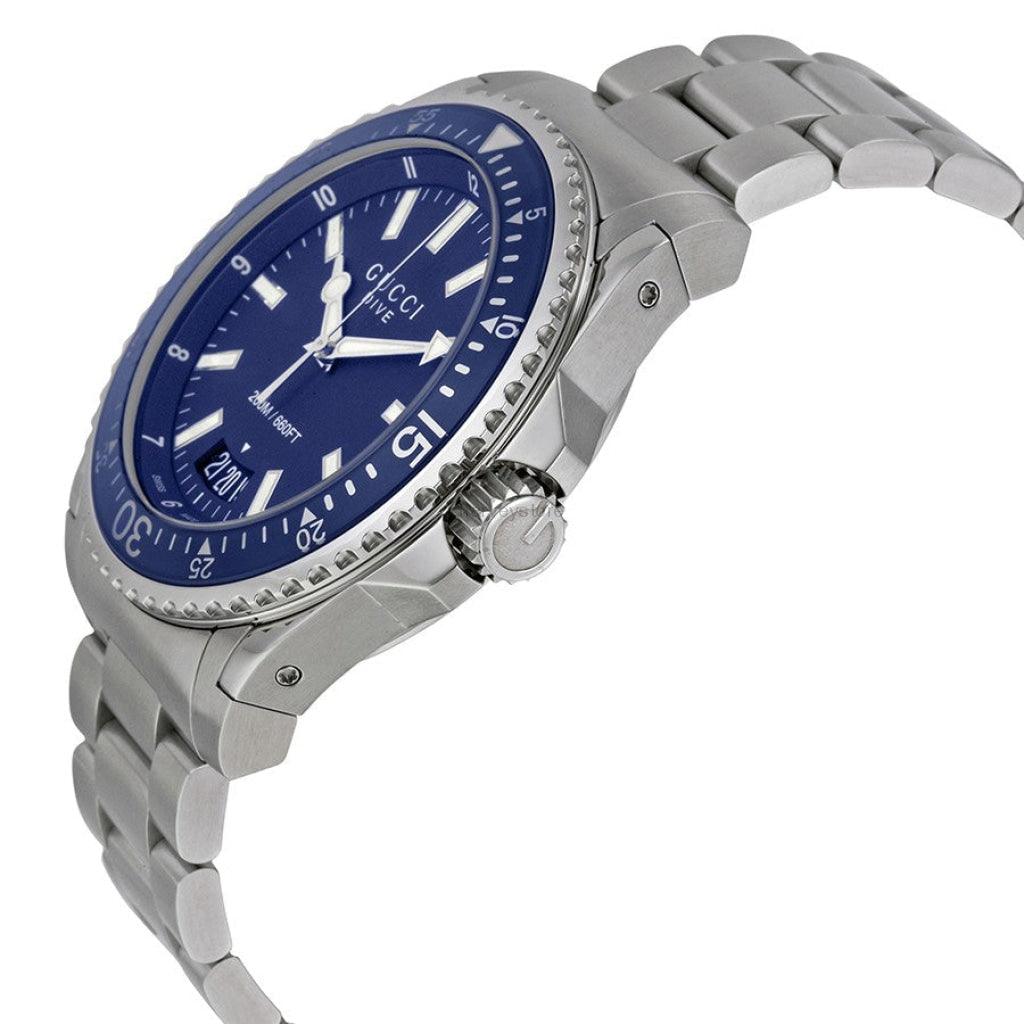 Gucci Dive YA136203 watch worn on wrist showing stainless steel bracelet