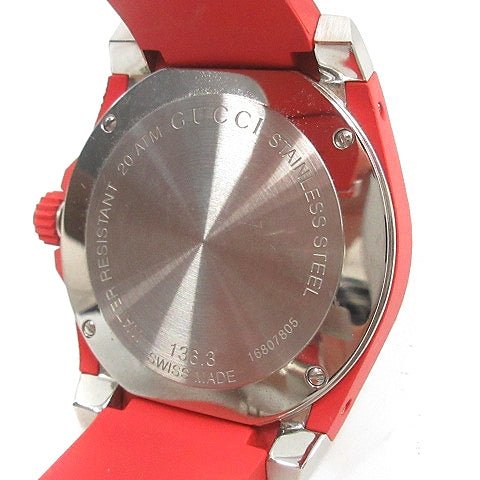 Gucci Dive watch caseback showing stainless steel with engraved text and Swiss Made