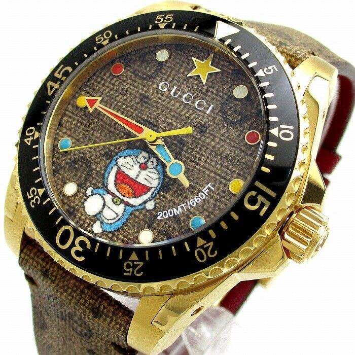 GUCCI Dive Doraemon dial featuring Doraemon character, colorful markers, and gold hands