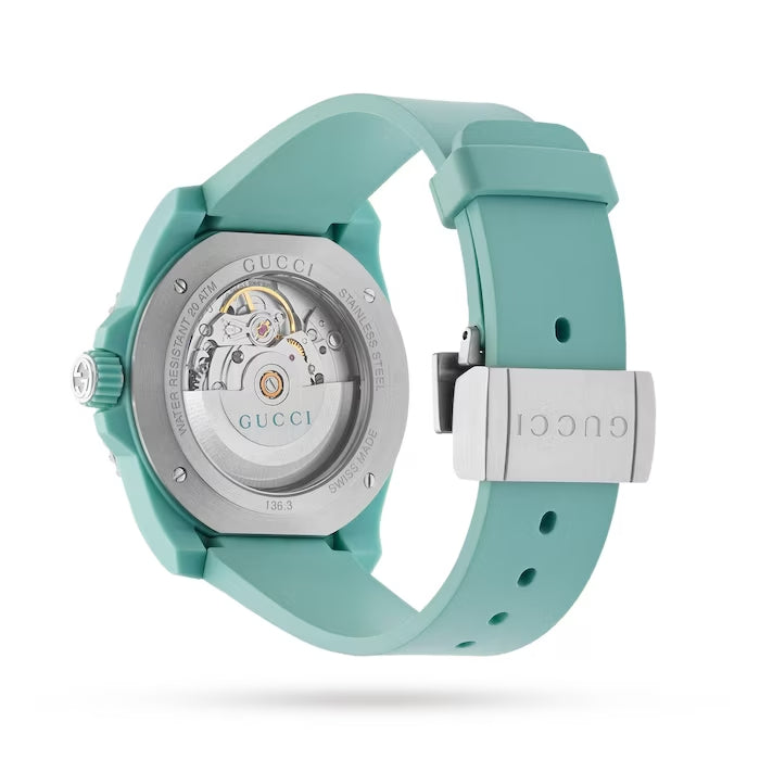 Gucci Dive watch with caseback visible showing automatic movement and metal back plate
