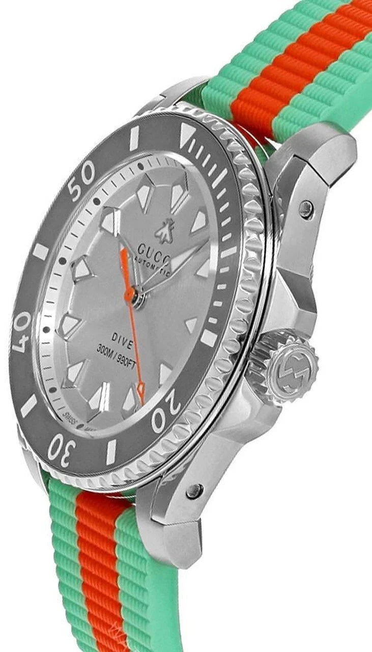 GUCCI Dive watch angled side view showing stainless steel case and color-block strap