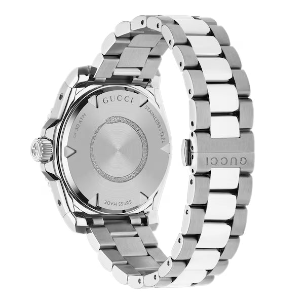 Gucci Dive watch caseback showing engraved movement and stainless steel strap