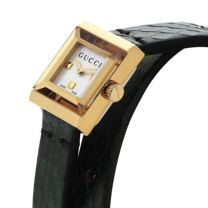 Gucci G Frame watch angled view showing gold case and black leather strap detail