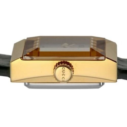 Close-up of Gucci G Frame mother of pearl dial with gold-tone case and crown