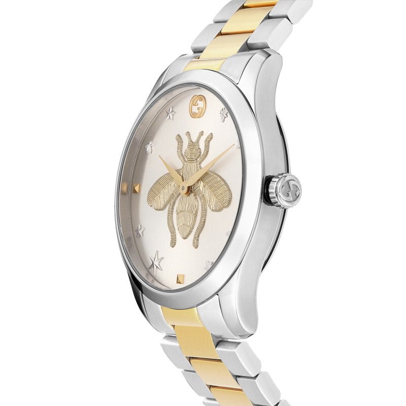 G-Timeless 38mm side profile view with two-tone bracelet and crown