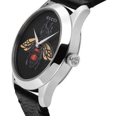 Side view of Gucci G-Timeless watch featuring embroidered honeybee motif on black dial