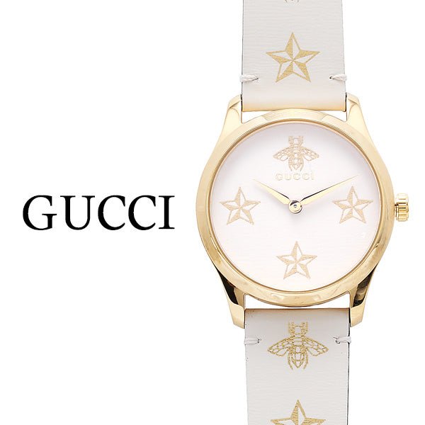 Gucci G-Timeless women's watch with cream dial, gold stars, bee motif, and leather strap