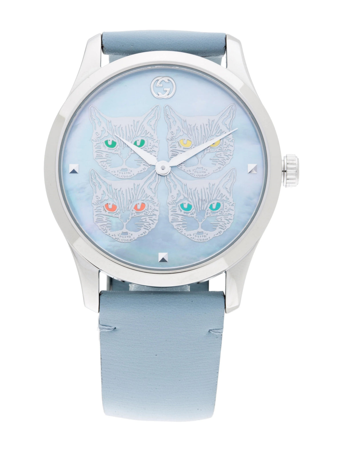 Front view of G-Timeless watch dial with four cat faces and colored crystal eyes
