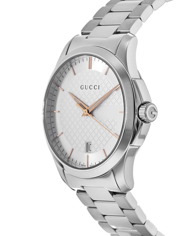 Side angle view of Gucci G-Timeless watch showing stainless steel bracelet and case