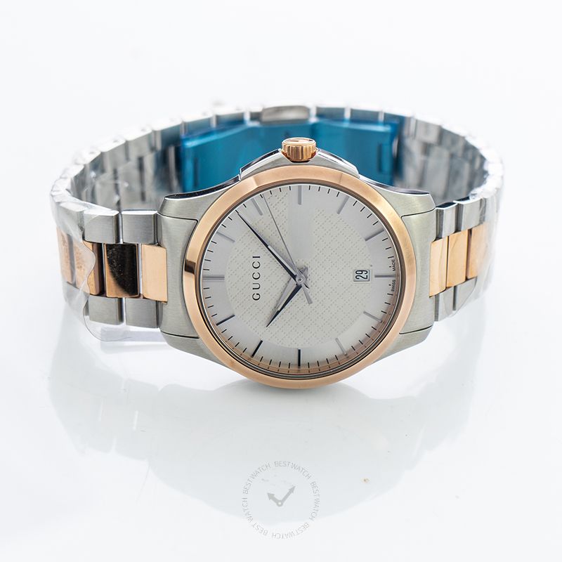 Gucci G-Timeless YA126447 watch displayed at angle showing silver dial and two-tone bracelet