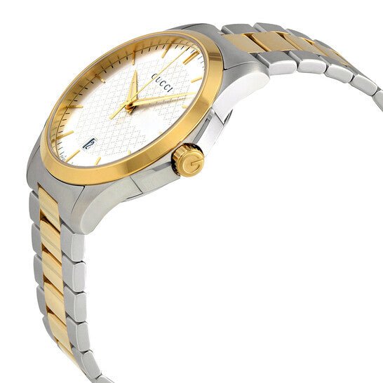 Gucci G-Timeless two-tone watch angled view showing gold bezel and silver dial