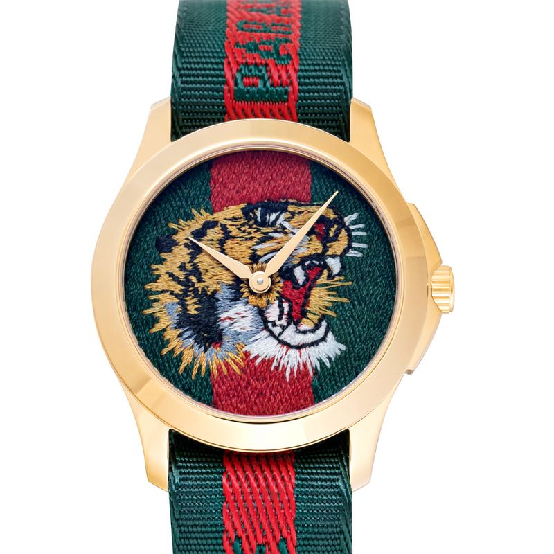 Gucci G-Timeless watch with gold case, tiger dial, and green/red Web nylon strap