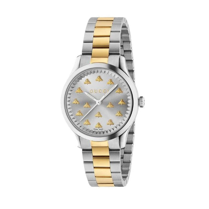 Angled view of Gucci G-Timeless watch showing dial with golden bee pattern and two-tone steel and gold bracelet