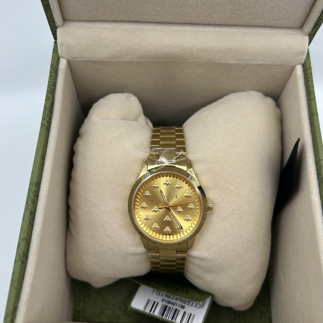 Gucci G-Timeless watch in green Gucci presentation box with protective cushioning