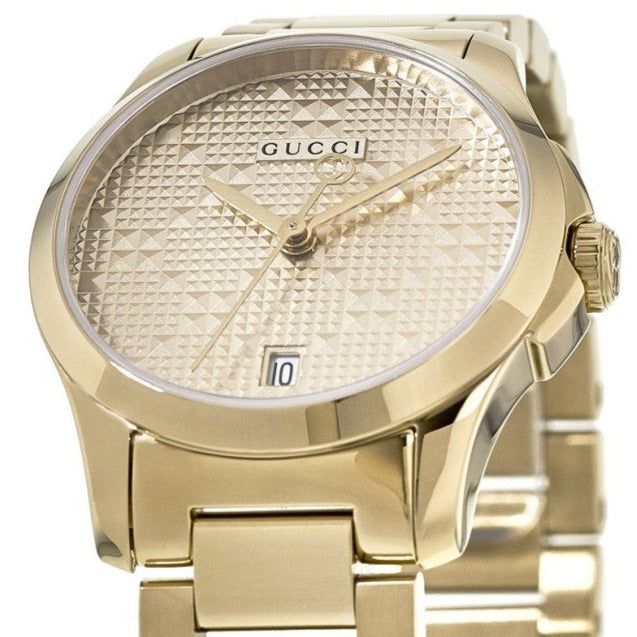 Gucci G-Timeless women's watch dial detail with date window