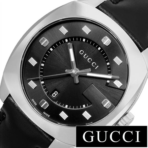 Gucci GG2570 dial detail showing black sunburst face with silver square hour markers