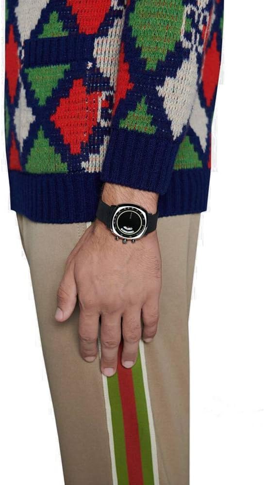 Gucci Grip chronograph watch worn on wrist showing dial and black rubber strap