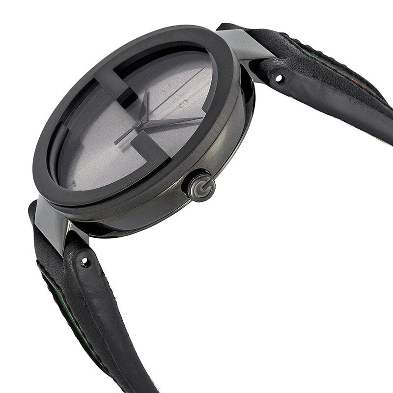 Angled view of Gucci watch showing black dial face with interlocking G indices and black leather strap