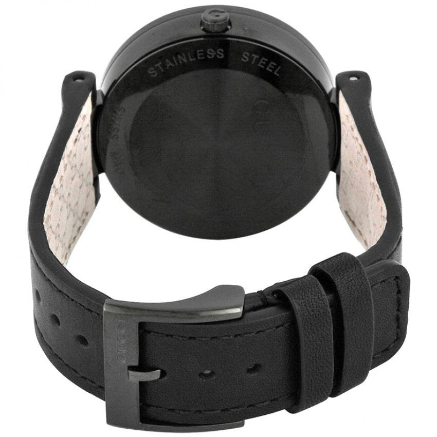 Caseback of Gucci Interlocking G watch showing stainless steel and leather strap