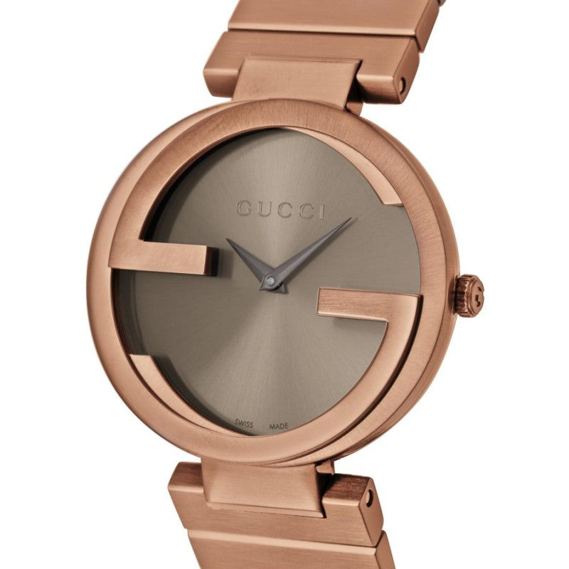 Gucci Interlocking G watch with brown PVD case and interlocking G dial detail