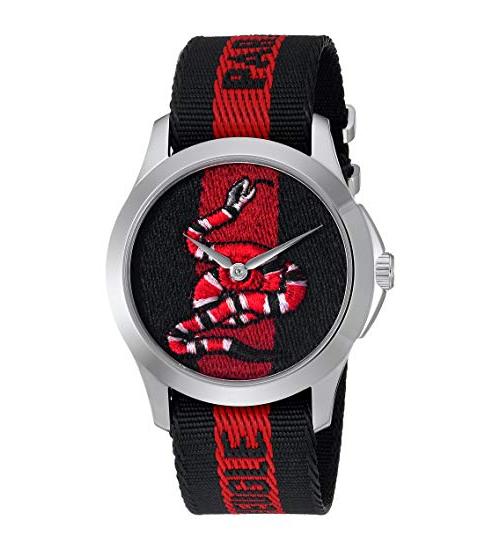 Gucci Le Marche Des Merveilles unisex watch displaying embroidered snake design on blue-red dial