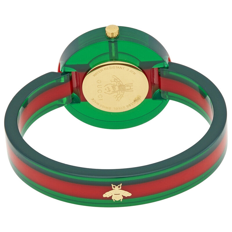 Caseback view of Gucci Vintage Web watch with engraved gold-tone plate and bee emblem on resin strap