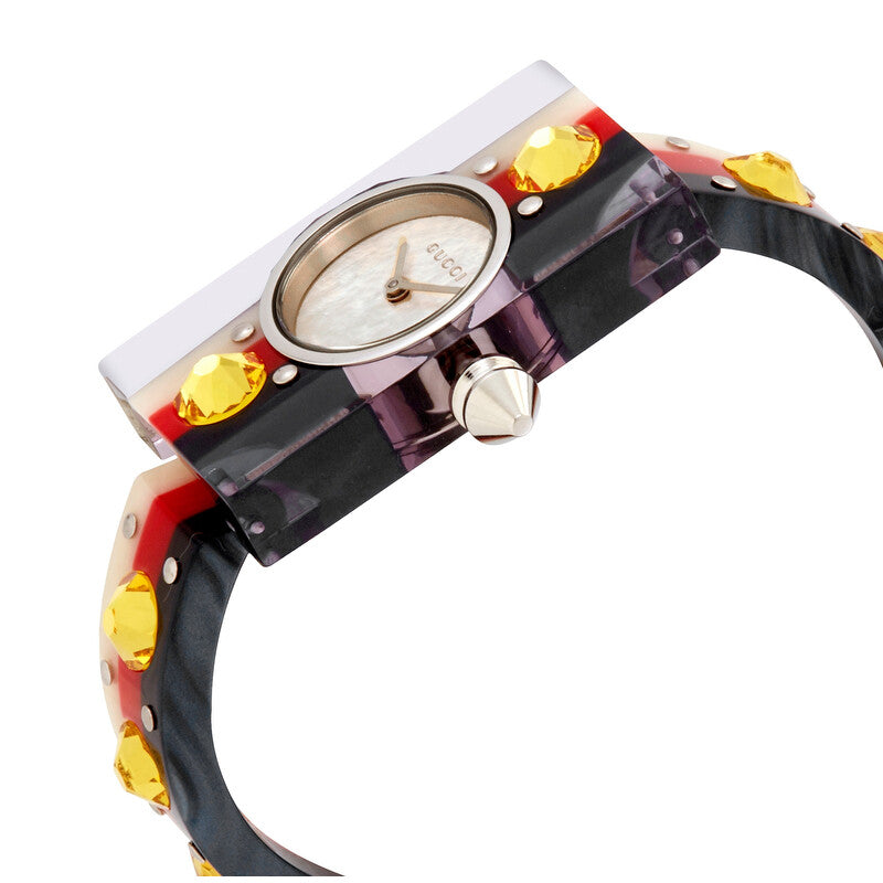 Gucci Vintage Web watch angled view showing stainless steel case and decorative strap details