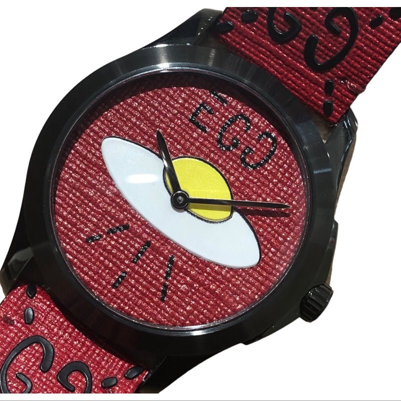Gucci YA1264023 watch on wrist showing UFO dial and GG strap detail