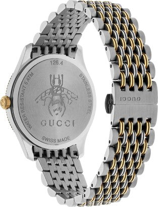 Gucci G Timeless caseback showing Swiss Made movement and model number