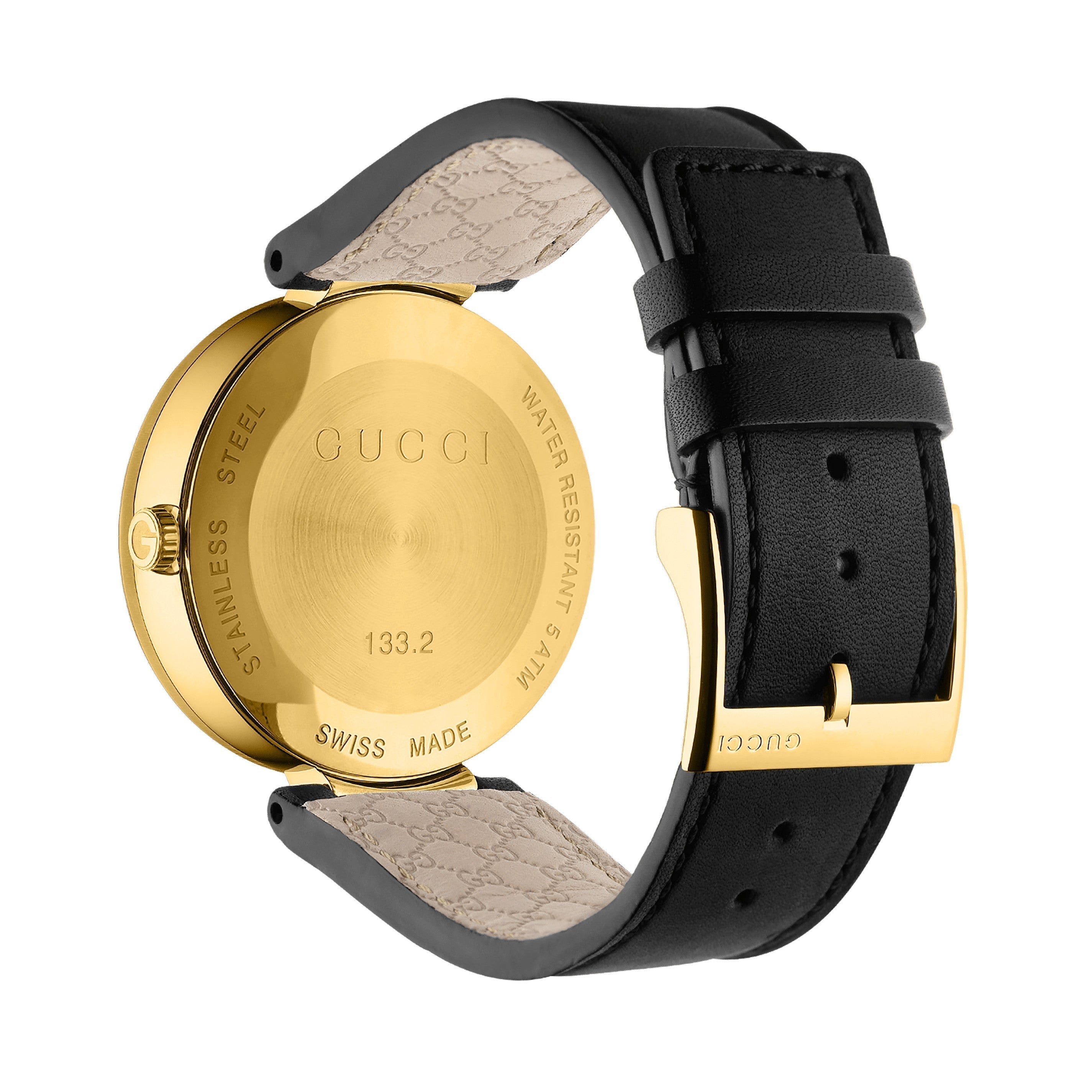 Caseback of Gucci Interlocking G watch showing Swiss made and model 133.2