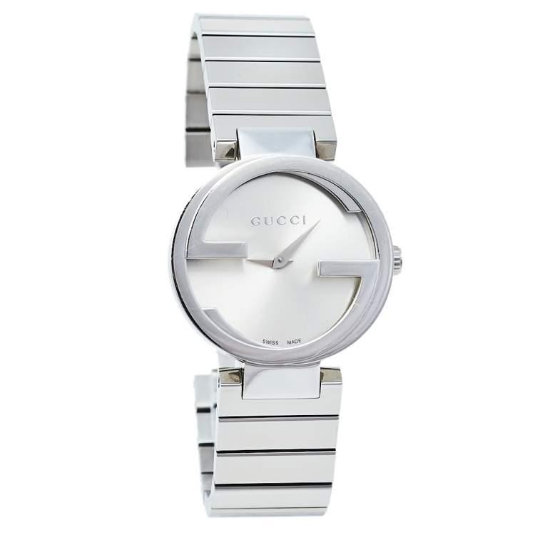 Gucci Interlocking G silver watch with minimalist dial featuring iconic G logo