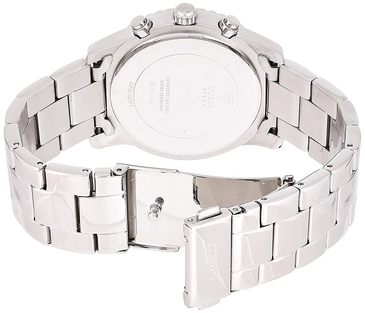 Stainless steel caseback with Guess branding and three pushers visible